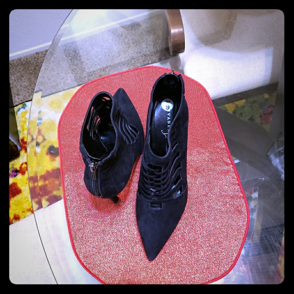 Never worn  black over the ankle heels